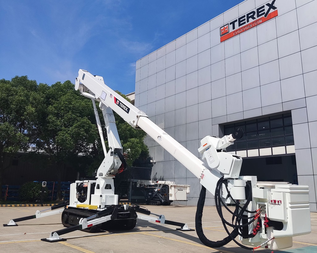 Terex TL45i aerial device in front of international Terex facility