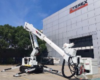 Terex TL45i aerial device in front of international Terex facility