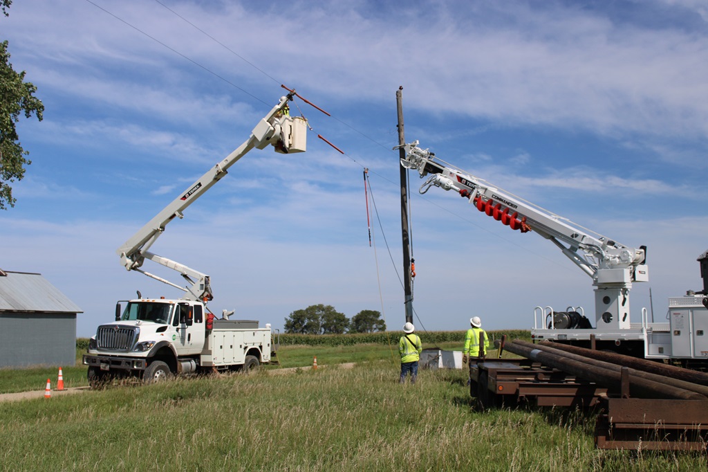 Terex bucket truck and digger derrick setting pole