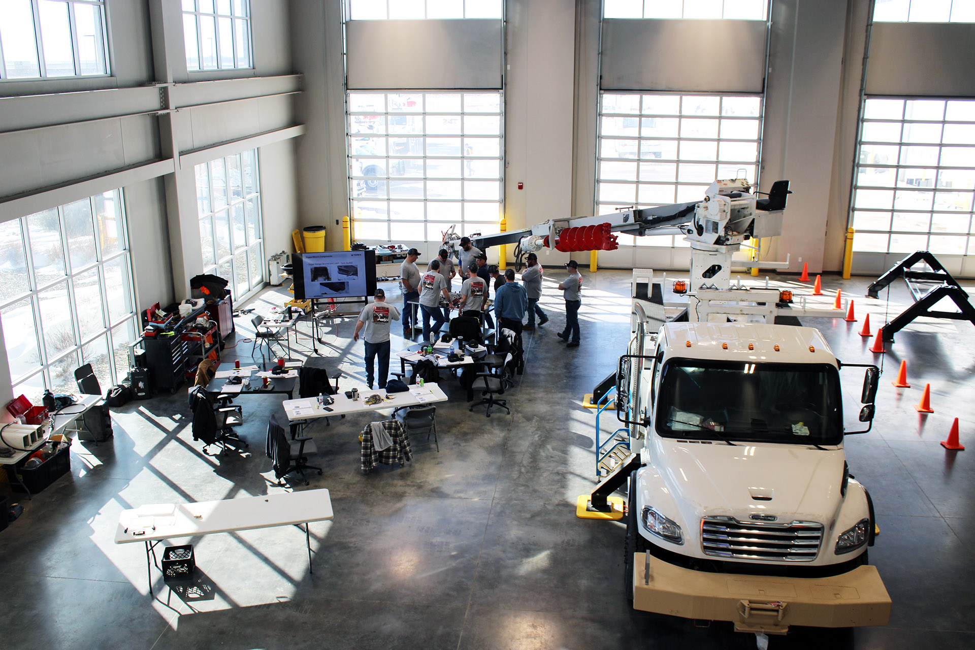 Technicians attending a Terex training on digger derricks