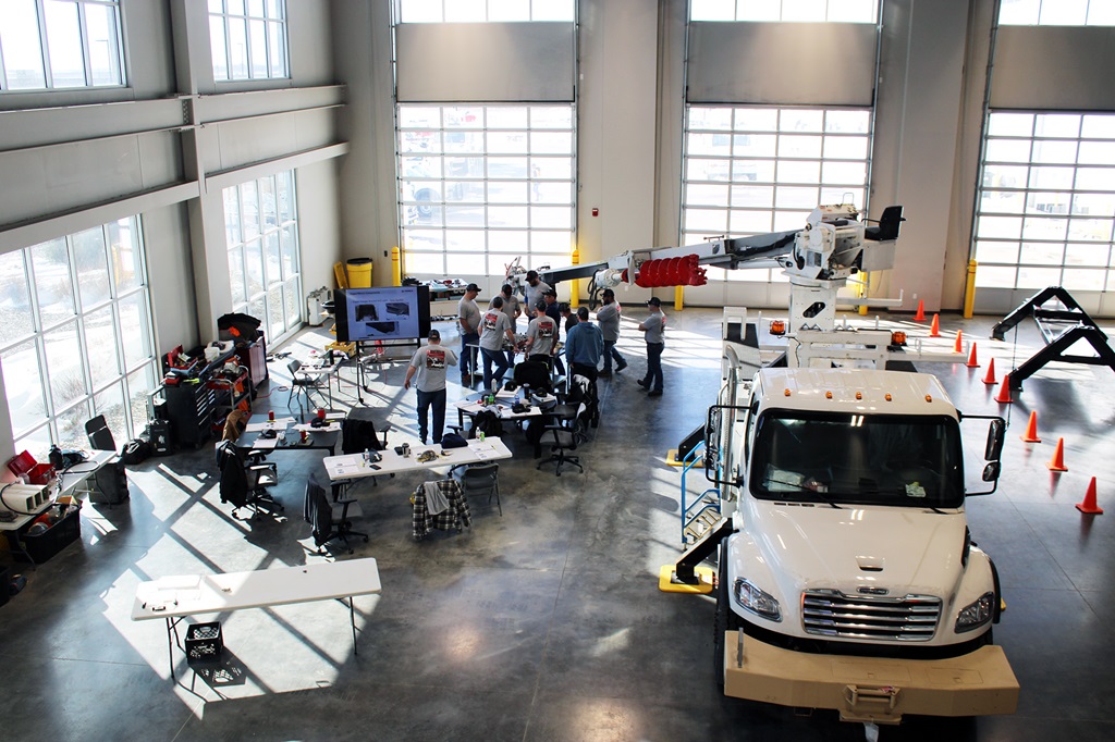 Technicians attending a Terex training on digger derricks