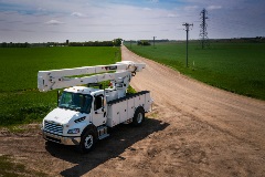 Terex Optima TC55 bucket truck parked on road