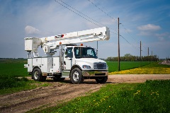 Terex Optima TC-55 bucket truck parked on road