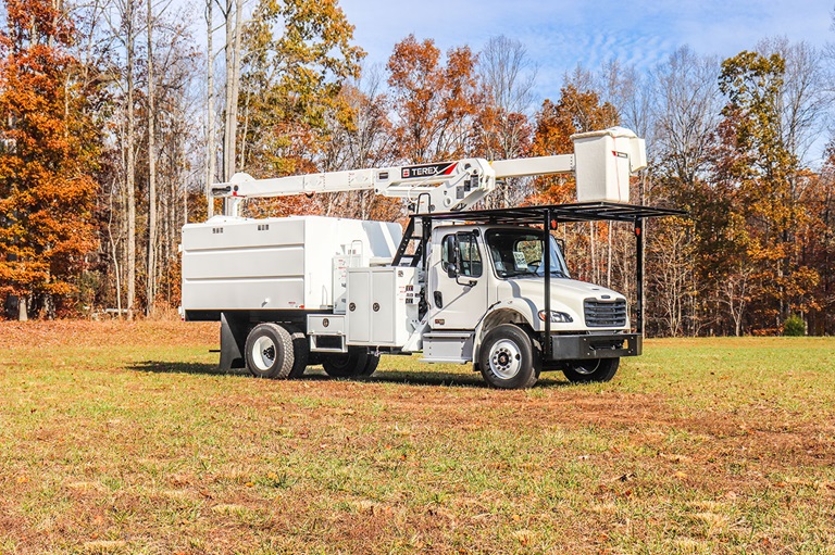 Terex XT Pro 60-70 bucket truck parked in forest