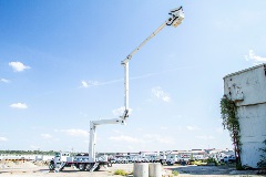 Terex TL80-112 transmission truck with boom extended