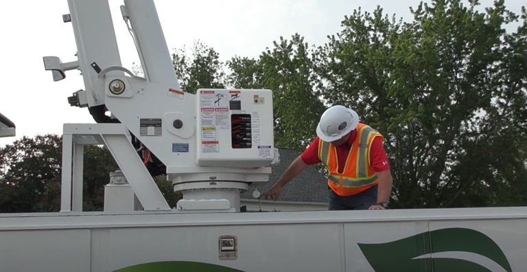 Terex technician working on a Terex bucket truck